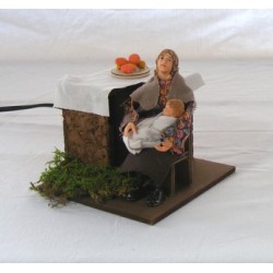 Woman cradling moving for crib